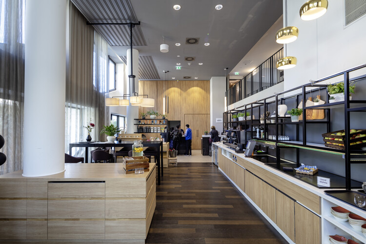 Flare of Frankfurt Apartments / Hadi Teherani Architects  - Interior Photography, Kitchen, Chair, Countertop